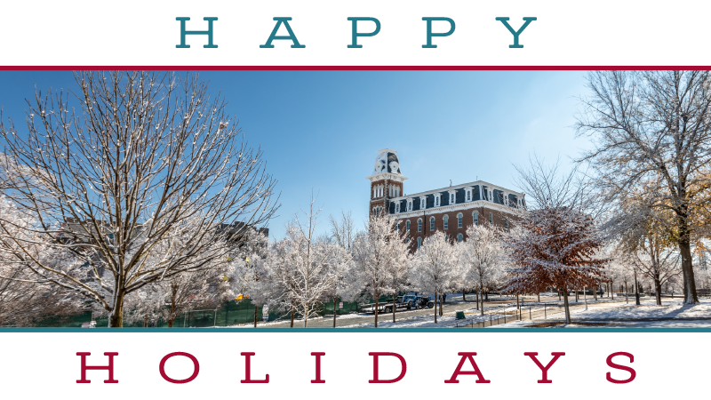 Image of a snowy Old Main with the words "Happy Holidays"